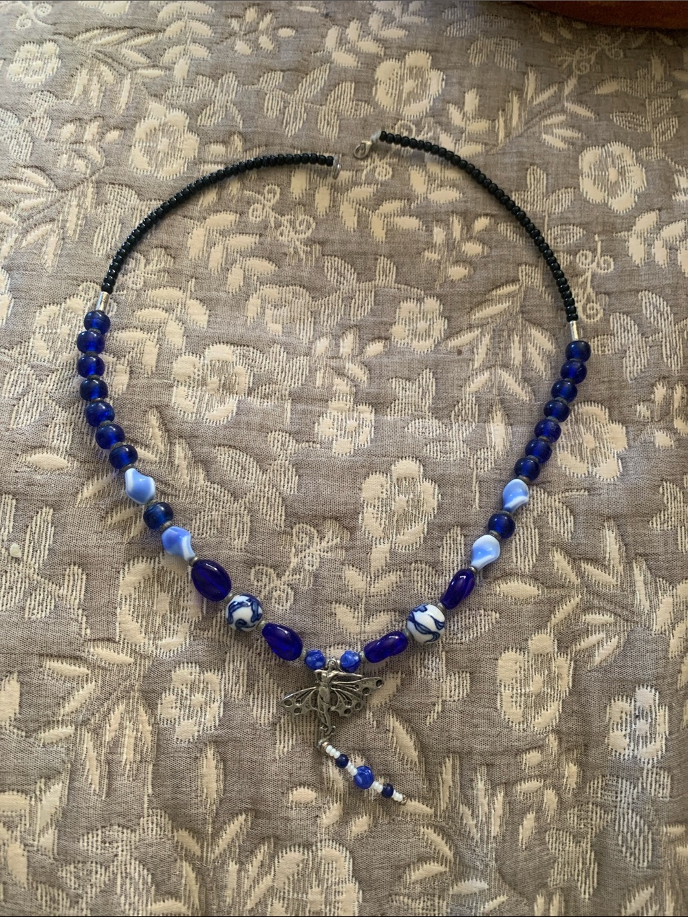 Necklace with blue stones.